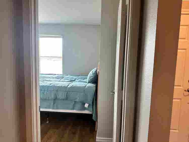 Furnished Bedroom w/ 2 Big windows.