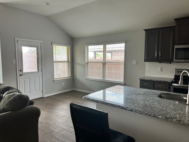 Furnished Bedroom w/ 2 Big windows.