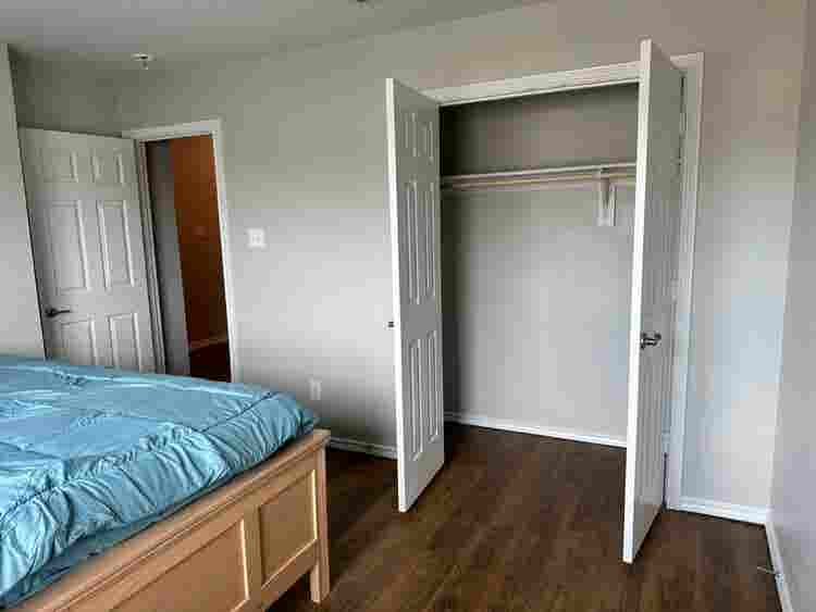 Furnished Bedroom w/ 2 Big windows.