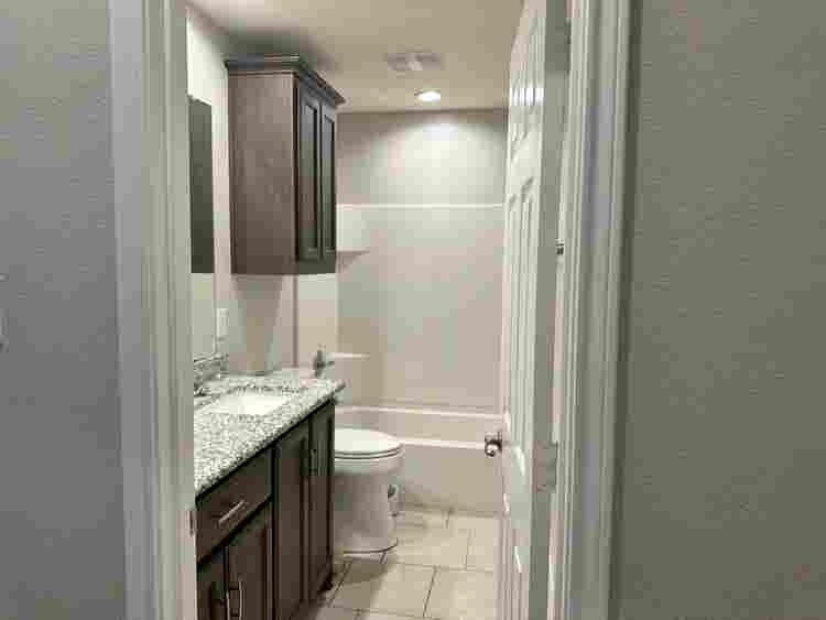 Furnished Bedroom w/ walk-in closet