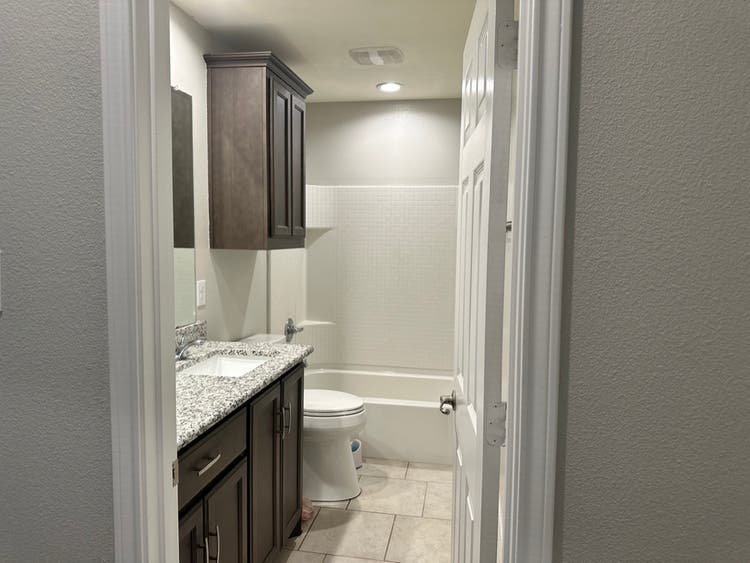 Furnished Bedroom w/ walk-in closet