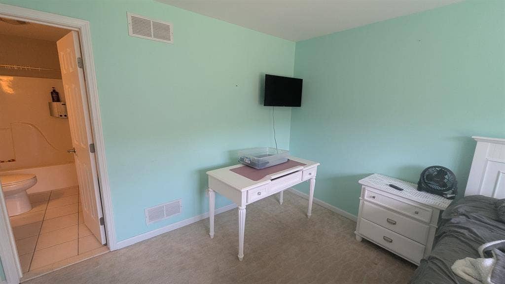 Room with private attached bathroom