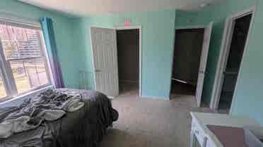 Room with private attached bathroom