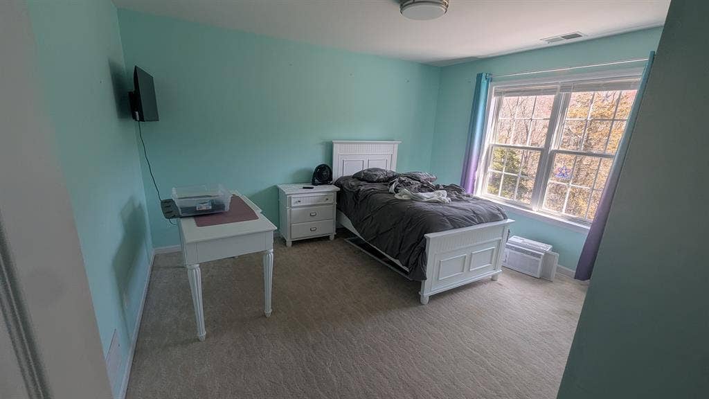 Room with private attached bathroom