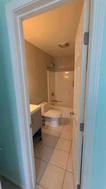 Room with private attached bathroom