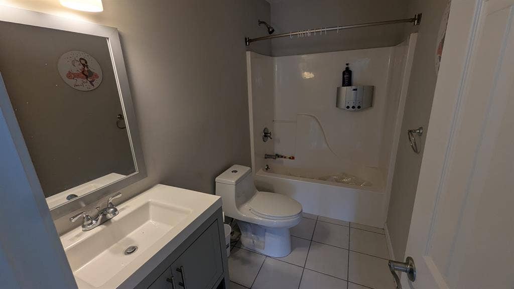 Room with private attached bathroom
