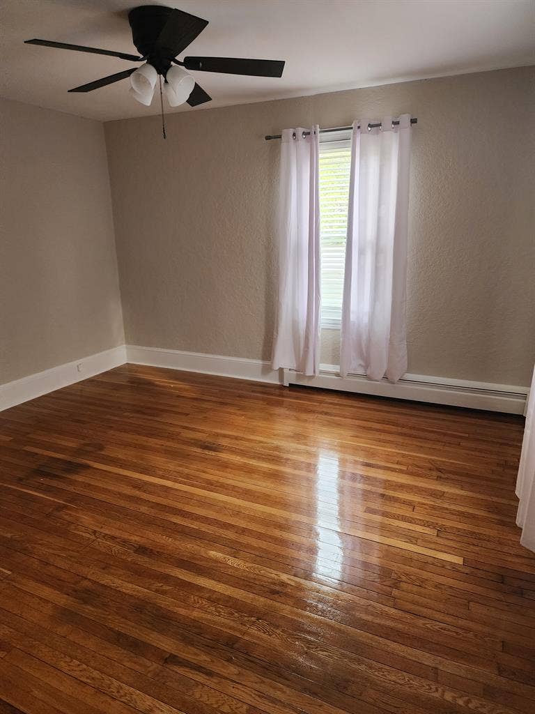 Spacious room w finished hardwood