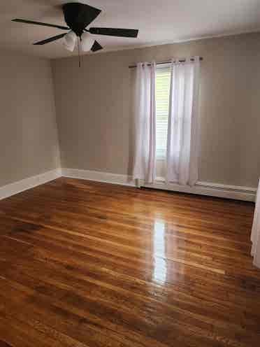 Spacious room w finished hardwood