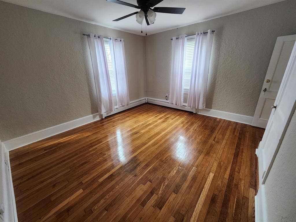 Spacious room w finished hardwood