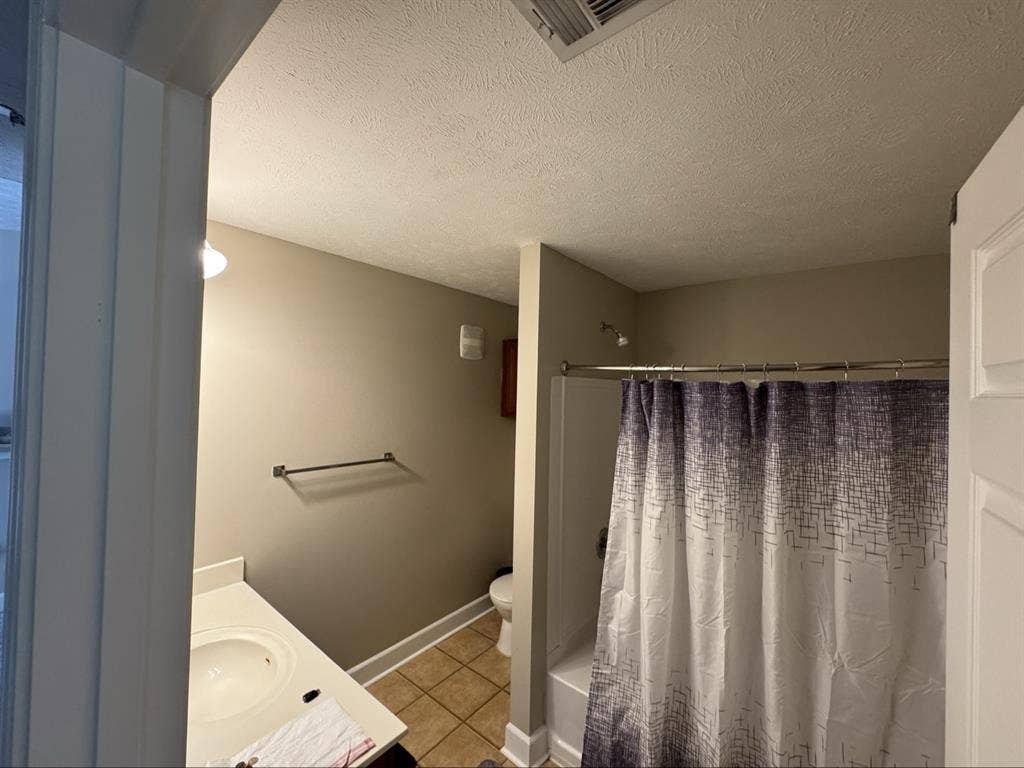 bedroom with private bathroom