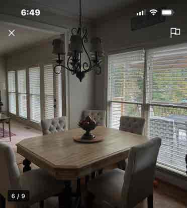 Furnished bedroom with queen bed