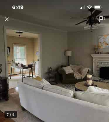 Furnished bedroom with queen bed