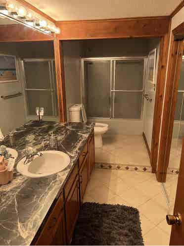 Spacious bedroom available .