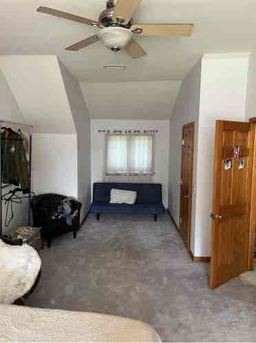 Spacious bedroom available .
