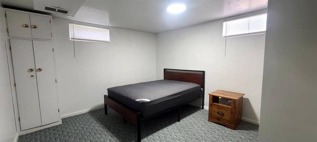 One bedroom with a shared bathroom