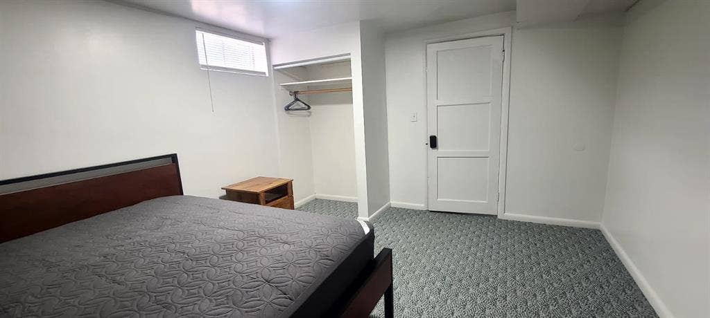 One bedroom with a shared bathroom