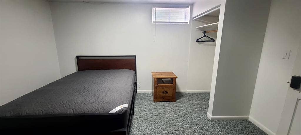 One bedroom with a shared bathroom