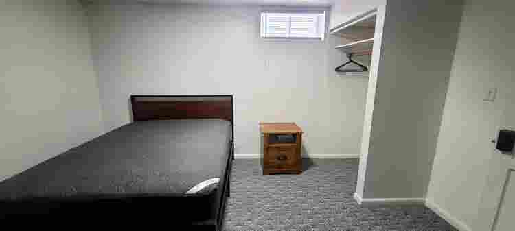 One bedroom with a shared bathroom