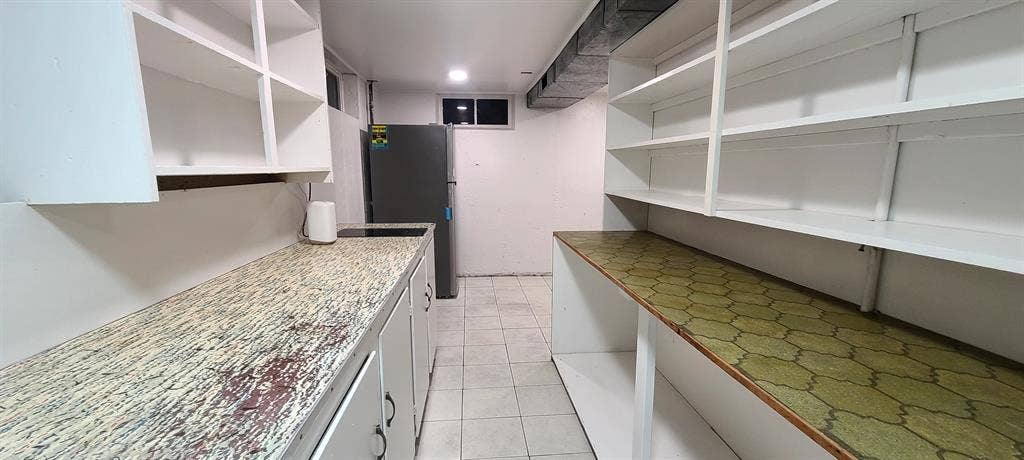 One bedroom with a shared bathroom
