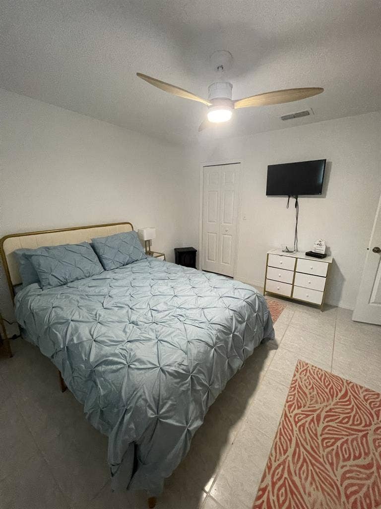 Furnished bedroom with private bath