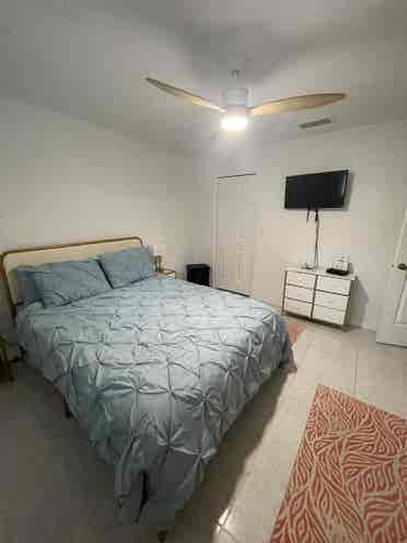 Furnished bedroom with private bath