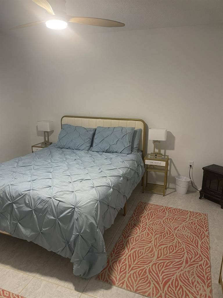 Furnished bedroom with private bath