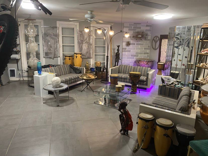 Large room in house with pool.