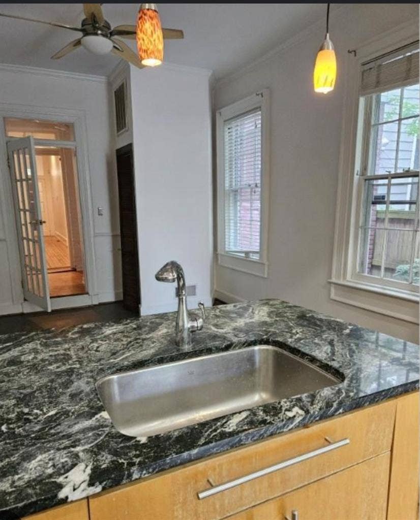 A room in a four bedroom house