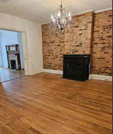 A room in a four bedroom house