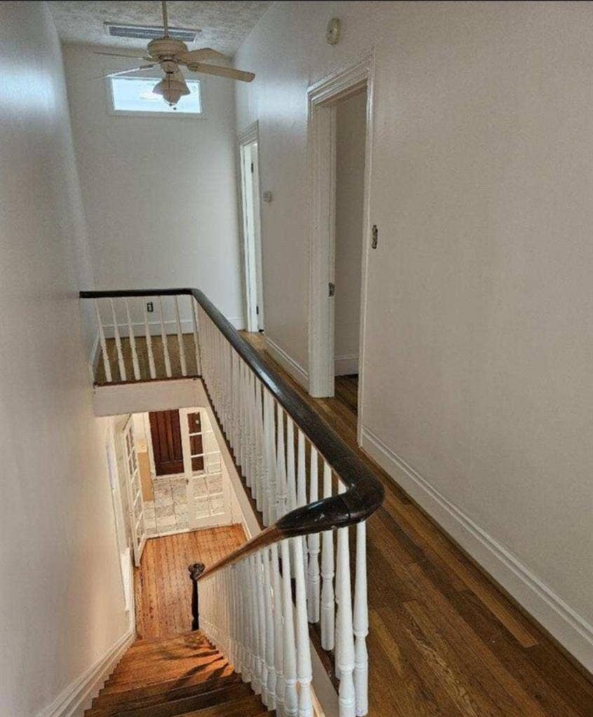 A room in a four bedroom house