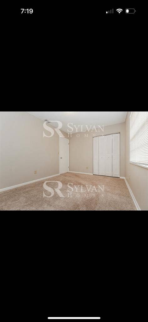 Cody bedroom with shared bathroom