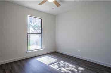 Room and bathroom with parking