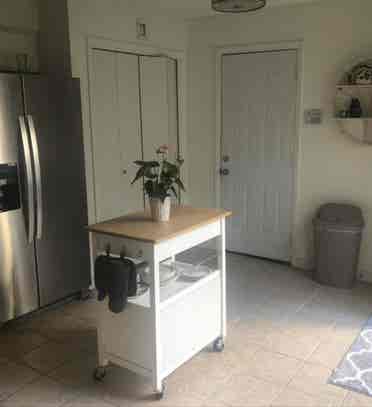Room and bathroom with parking
