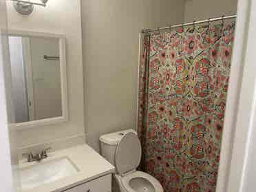 Room and bathroom with parking