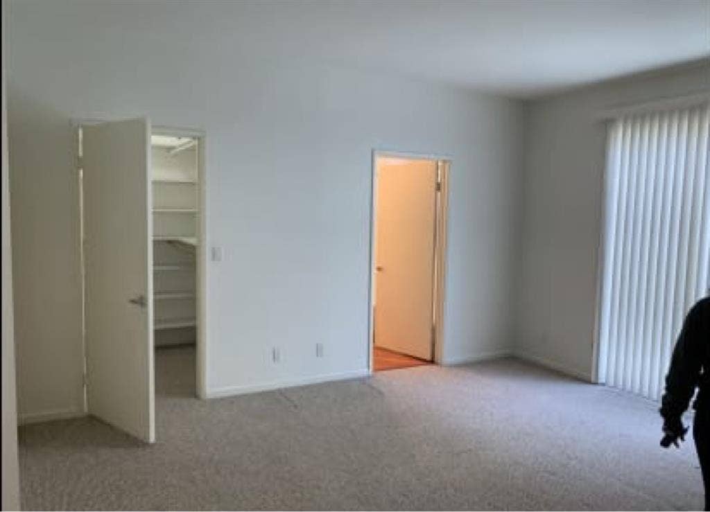 HUGE MASTER BEDROOM. In a Large Apt