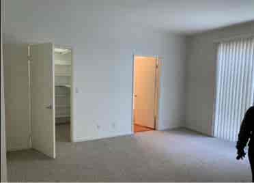 HUGE MASTER BEDROOM. In a Large Apt