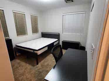 Room with all new bed and furniture