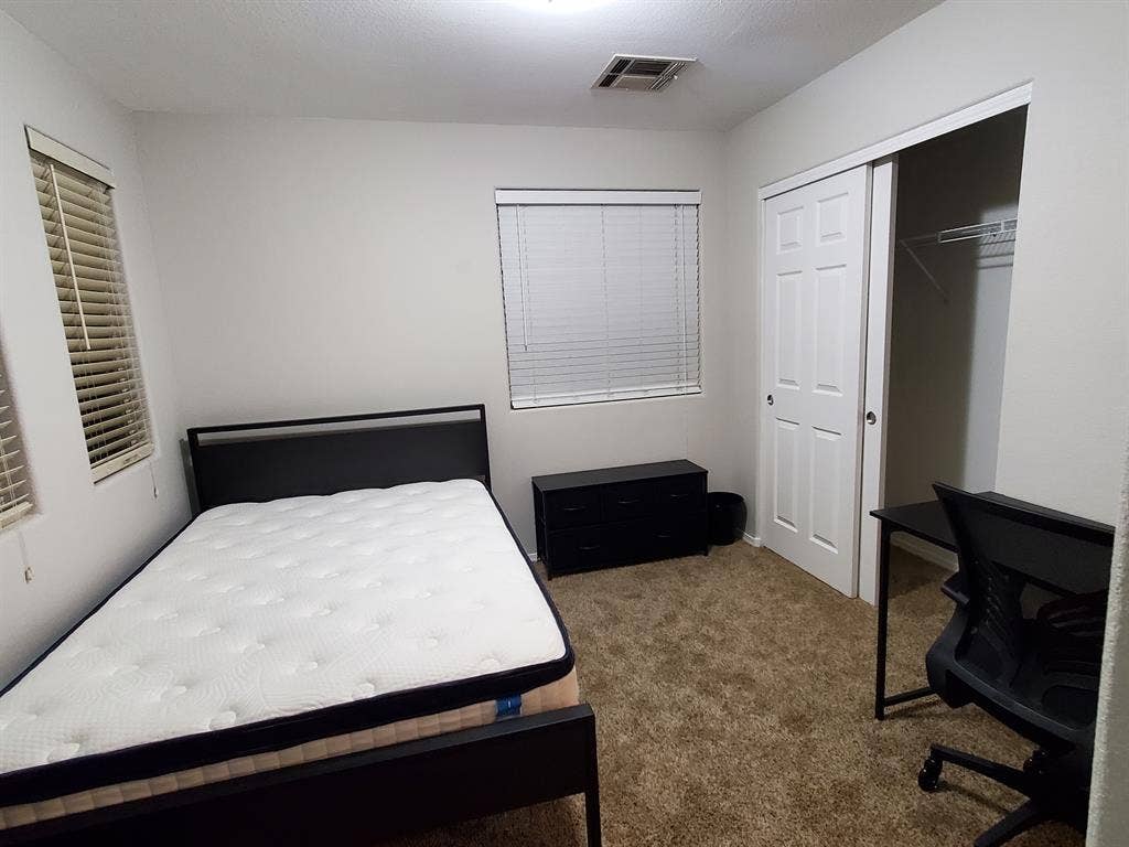 Room with all new bed and furniture
