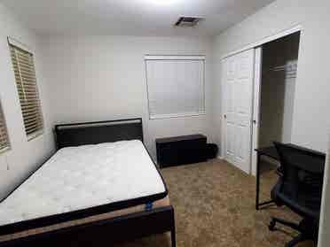 Room with all new bed and furniture