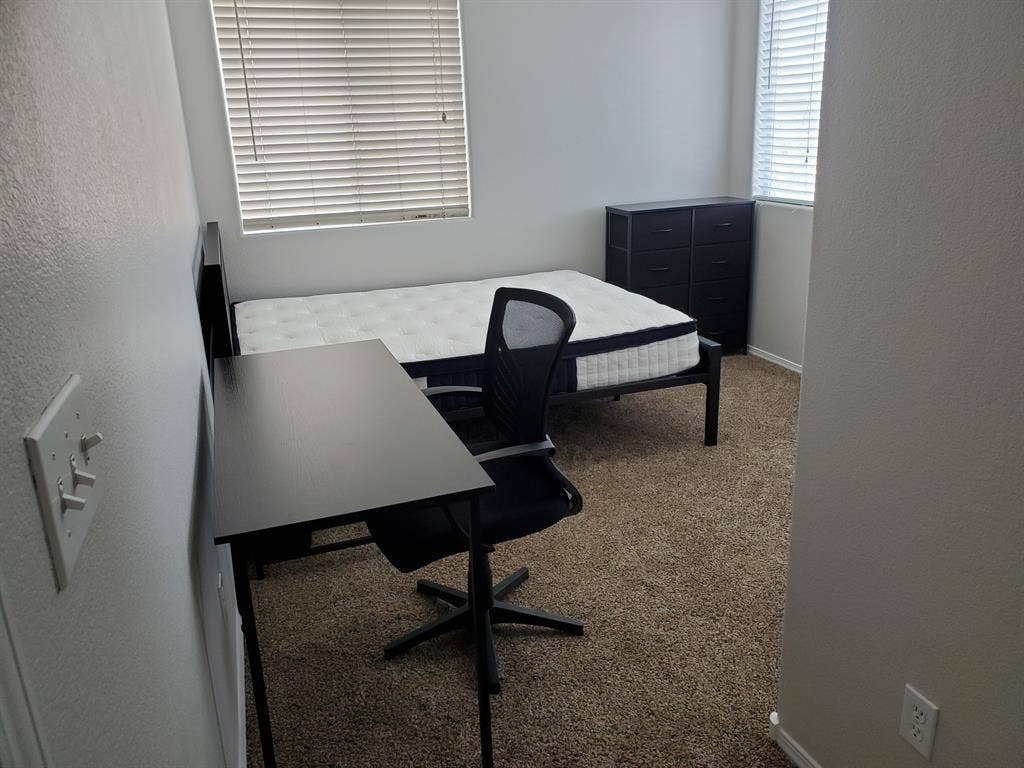 Room with all new bed and furniture