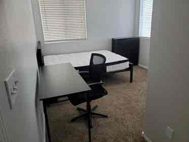 Room with all new bed and furniture
