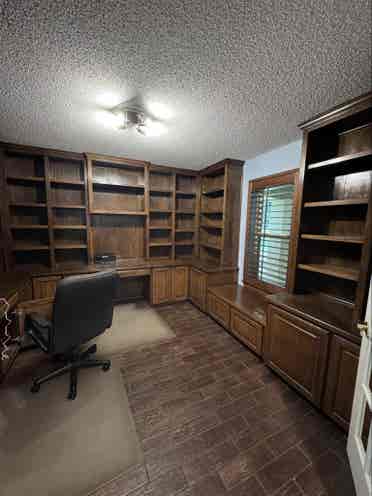 Furnished room with private office.