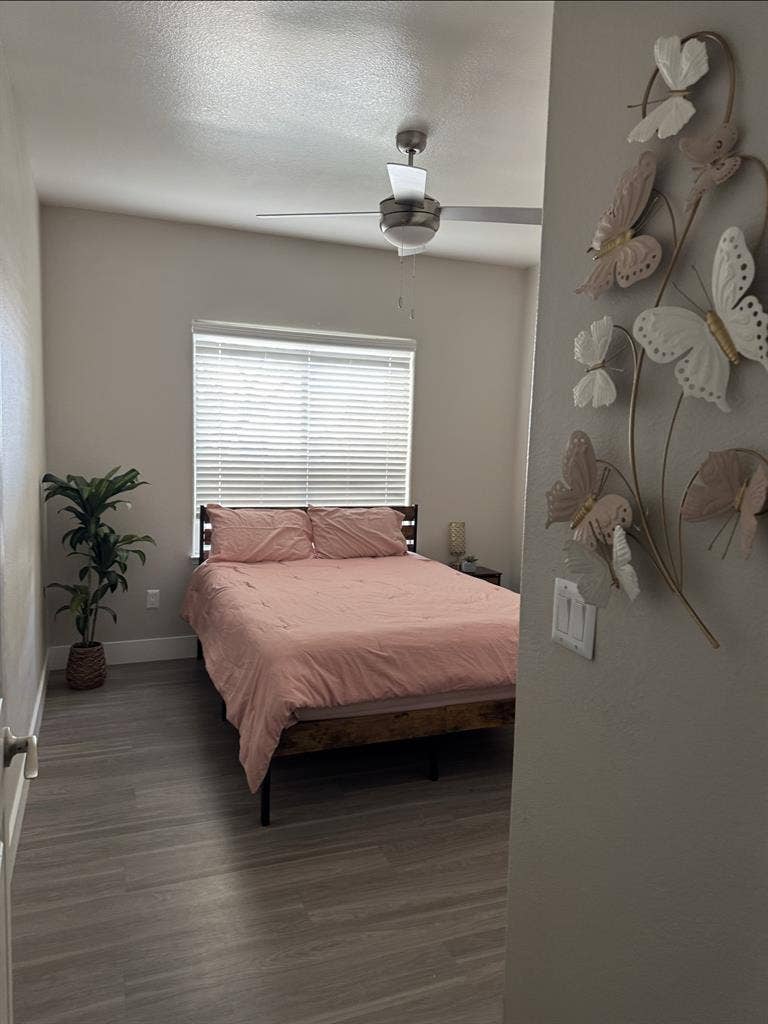 furnished bedroom private bathroom