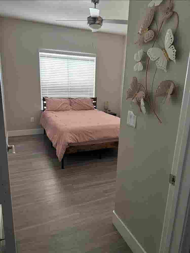 furnished bedroom private bathroom