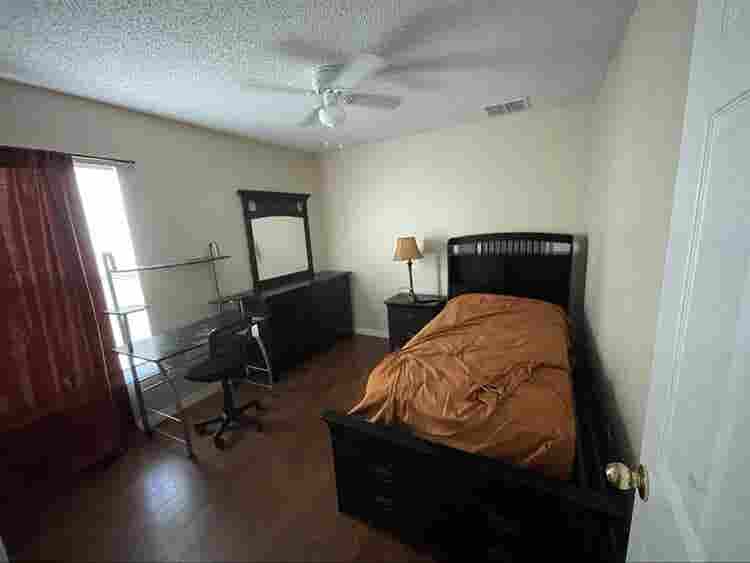 furnished
 bedroom with private bath