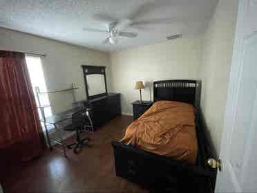 furnished
 bedroom with private bath