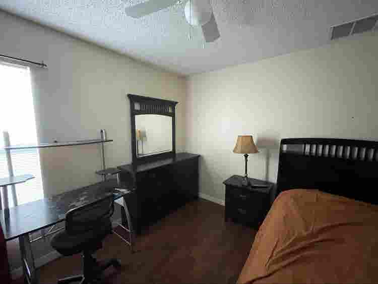 furnished
 bedroom with private bath