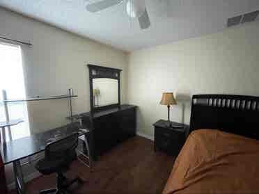 furnished
 bedroom with private bath