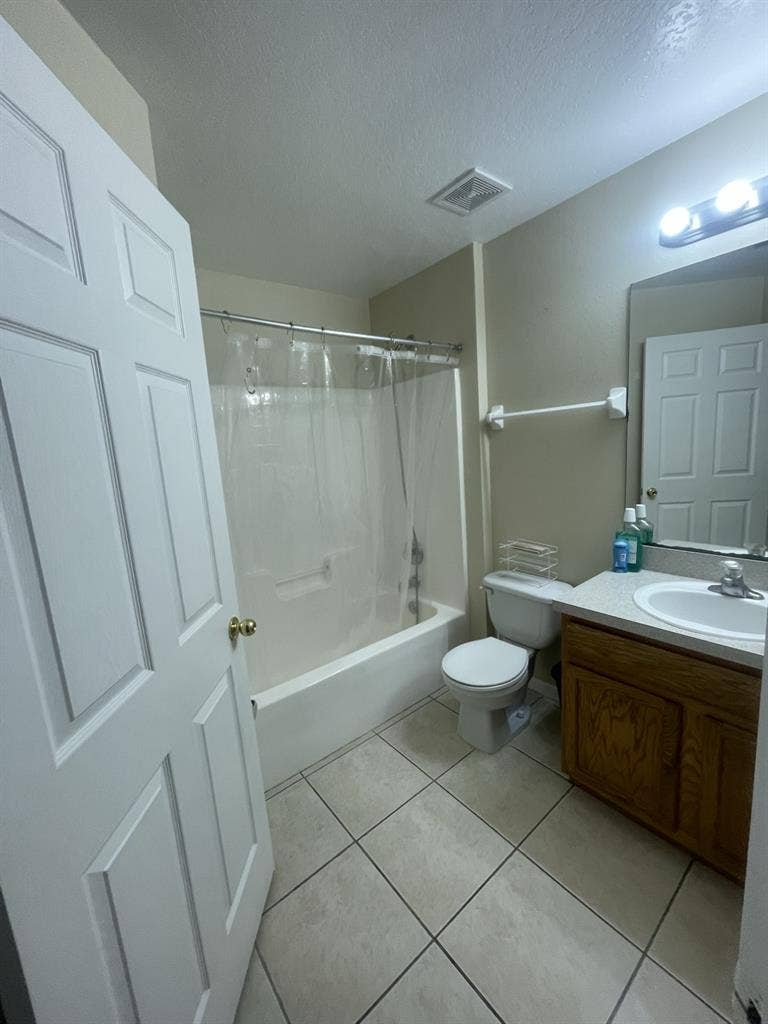 furnished
 bedroom with private bath