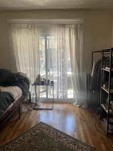 Room with an attached balcony